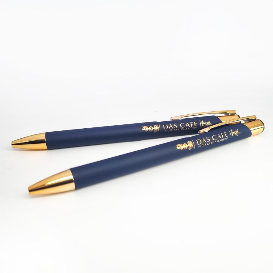 Kundenbestellung: Logo in Gold auf blauem Kugelschreiber graviert